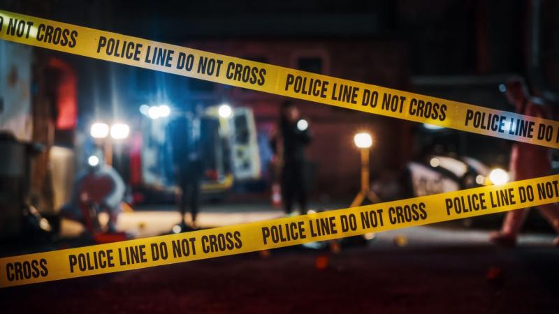 police tape at a murder crime scene