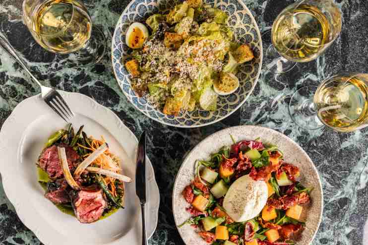 A table full of brunch dishes CATCH.