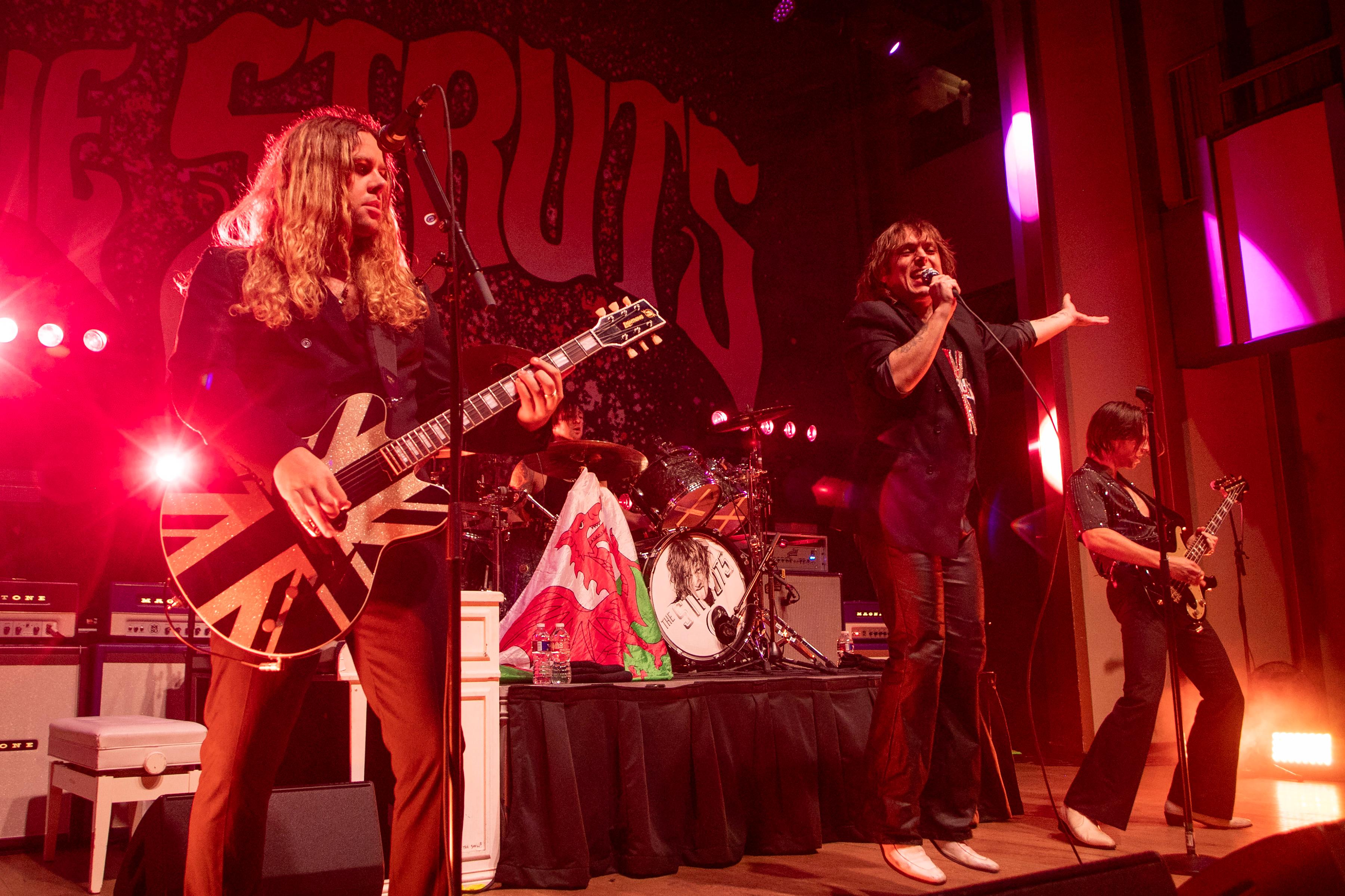 Band jumping on stage