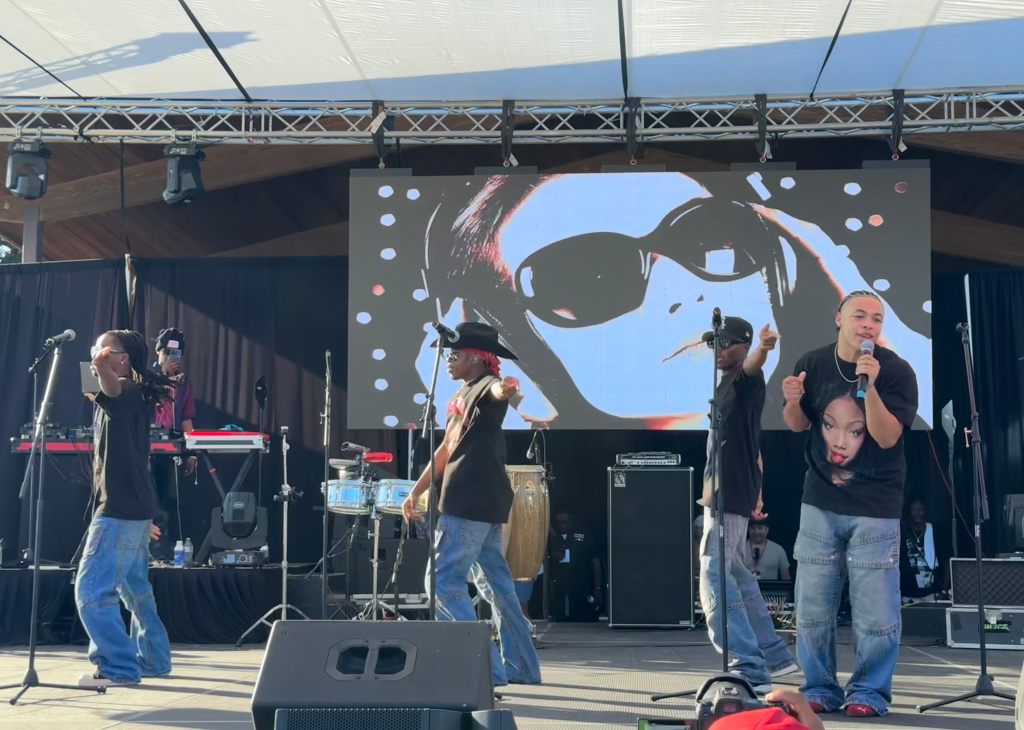 Group performing on stage