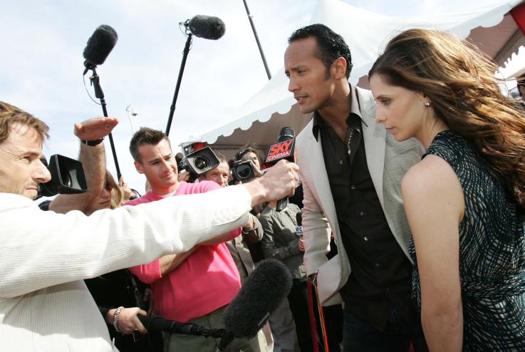 Actors Dwayne Johnson and Sarah Michelle Gellar promote the film Southland Tales at the Palais during the 59th International Cannes Film Festival on May 21, 2006.