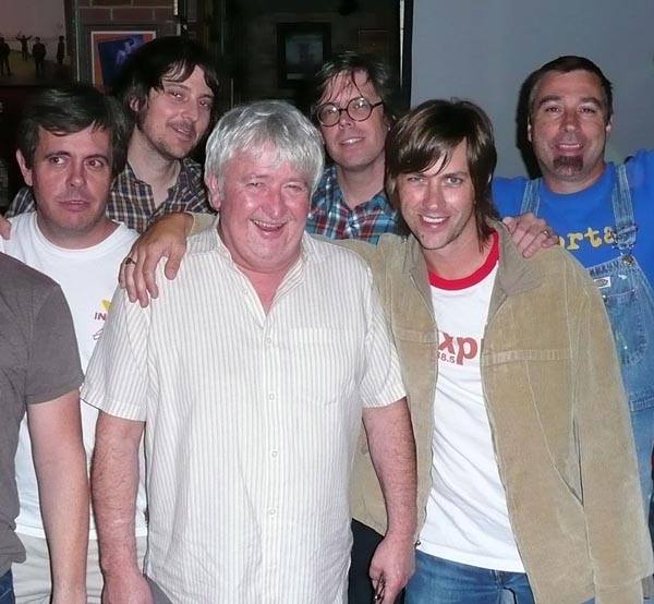 Band posing for a photo