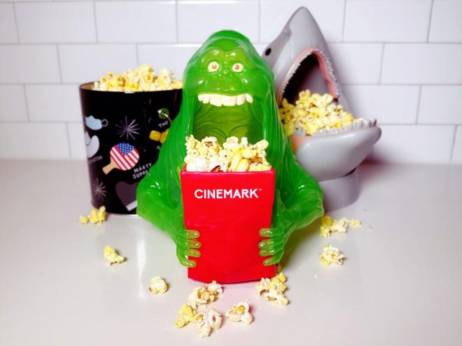 popcorn buckets filled with movie popcorn