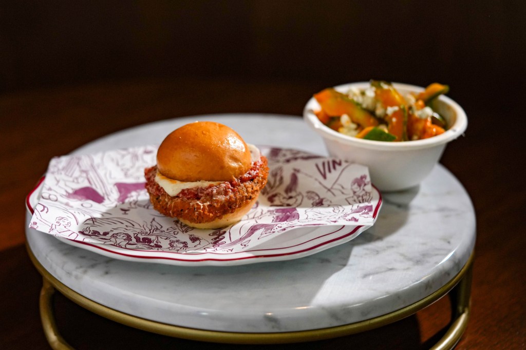 Carbone Chicken Sandwich with cucumber salad.