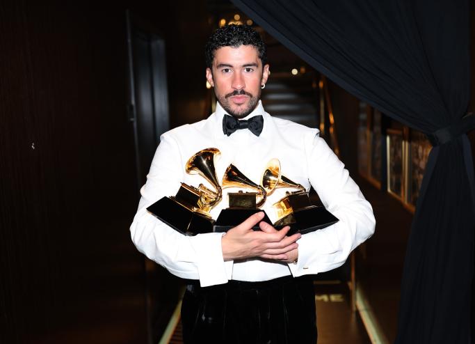 Bad Bunny poses with the Album of the Year, Best Música Urbana Album, and Best Global Music Performance Awards during the 68th GRAMMY Awards