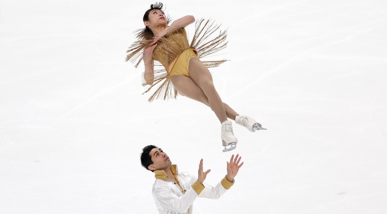Emily Chan skates with Spencer Howe in the Pairs Short Program during the U.S. Figure Skating Championships in 2024.