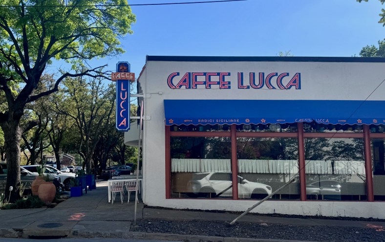 The sign and exterior of Caffe Lucca in Dallas