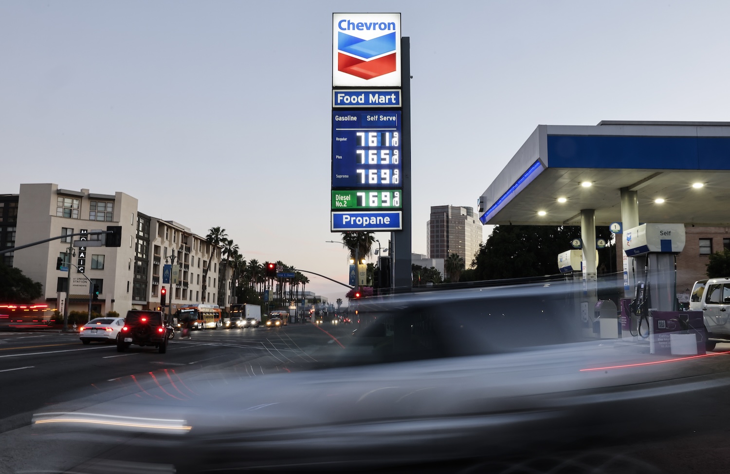 A sign at a gas station showing gas prices above $7 in Los Angeles.
