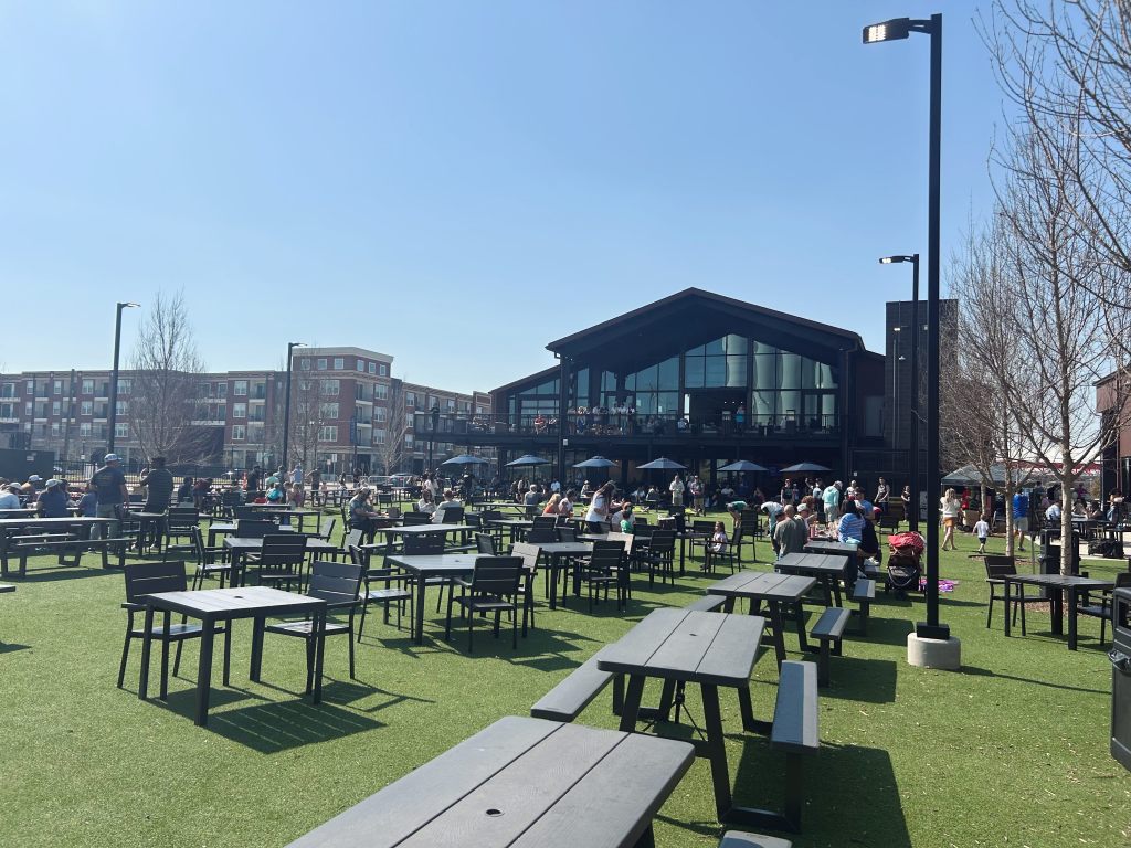 Rollertown's massive new turf courtyard on a sunny day.