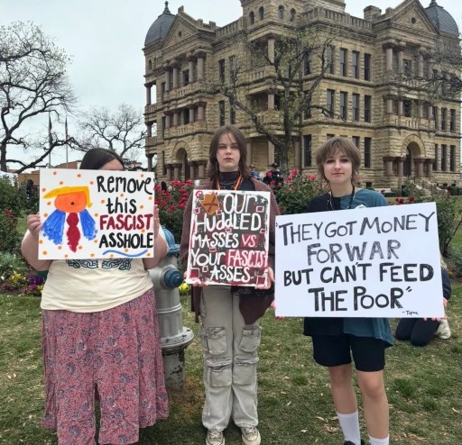 Denton NO Kings protesters with signs