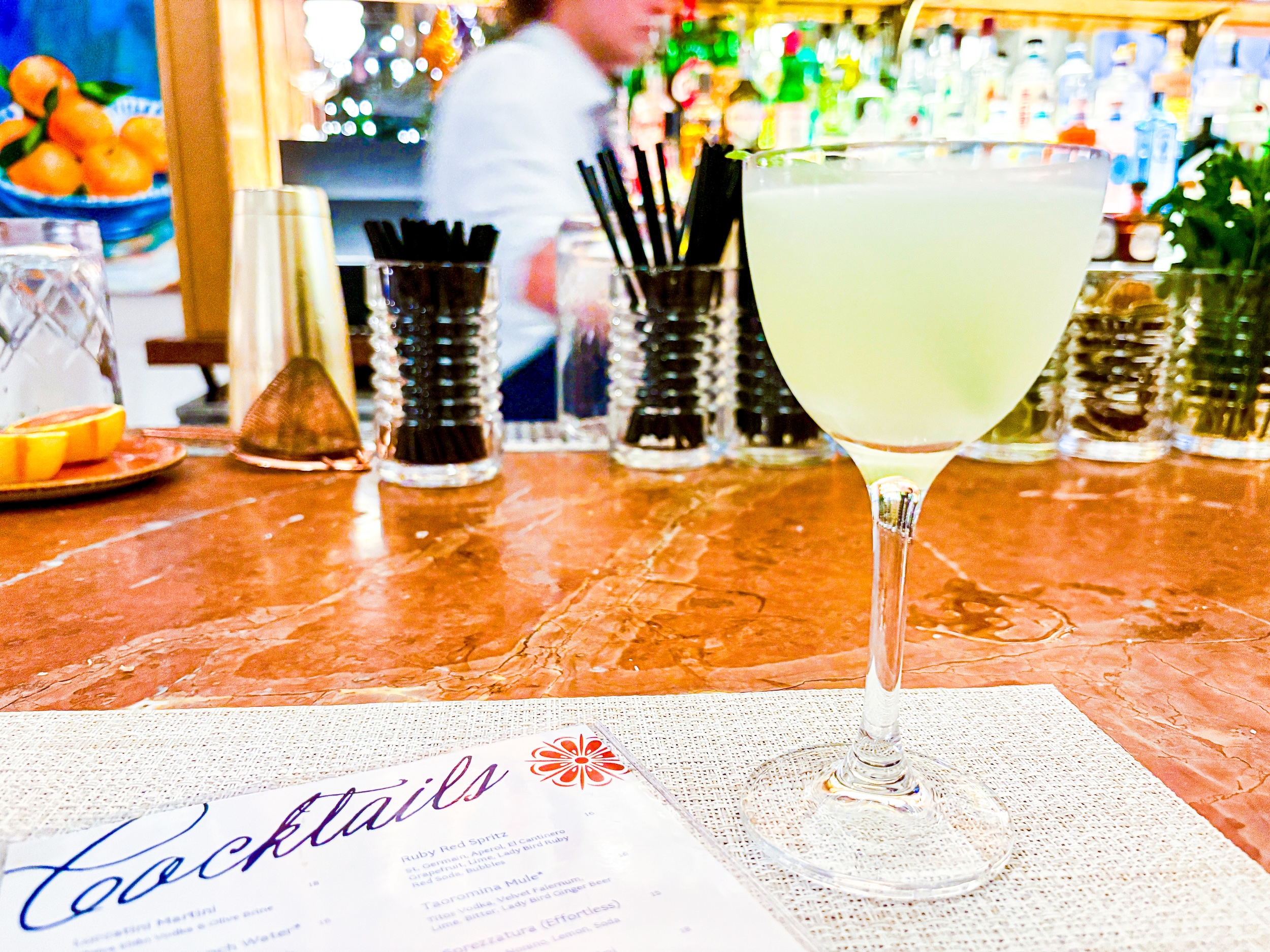 A White Lotus, a refreshing gin cocktail with hints of laurel leaves.