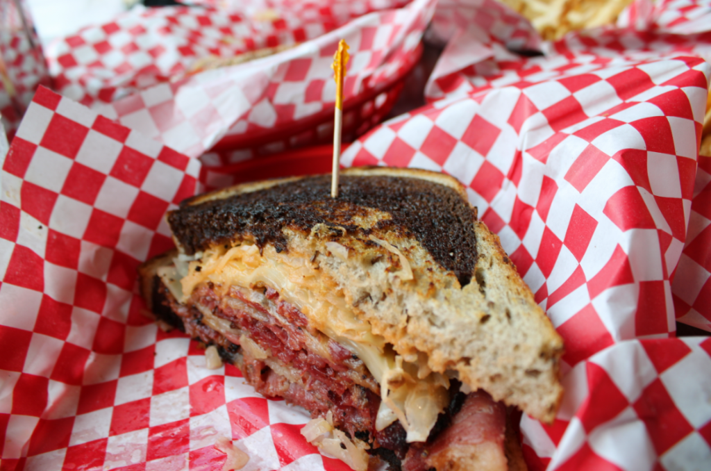 Seegars Reuben with pastrami, sauerkraut and dressing on marbled rye.
