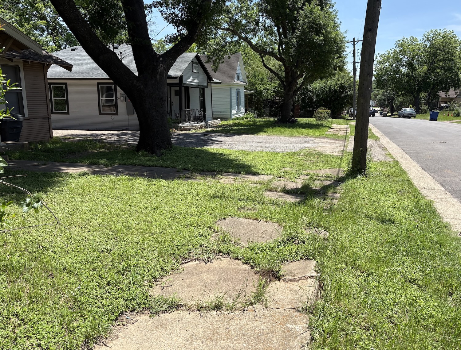 broken sidewalks in 10th street