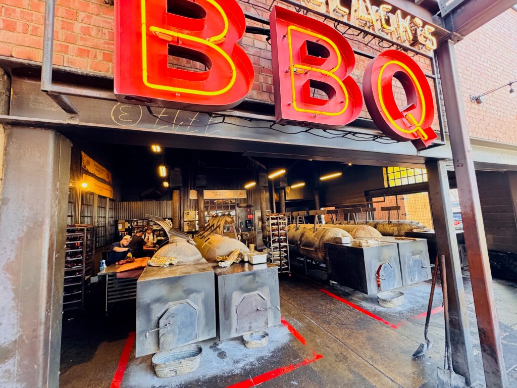 a BBQ sign and the smokers at Terry Black's