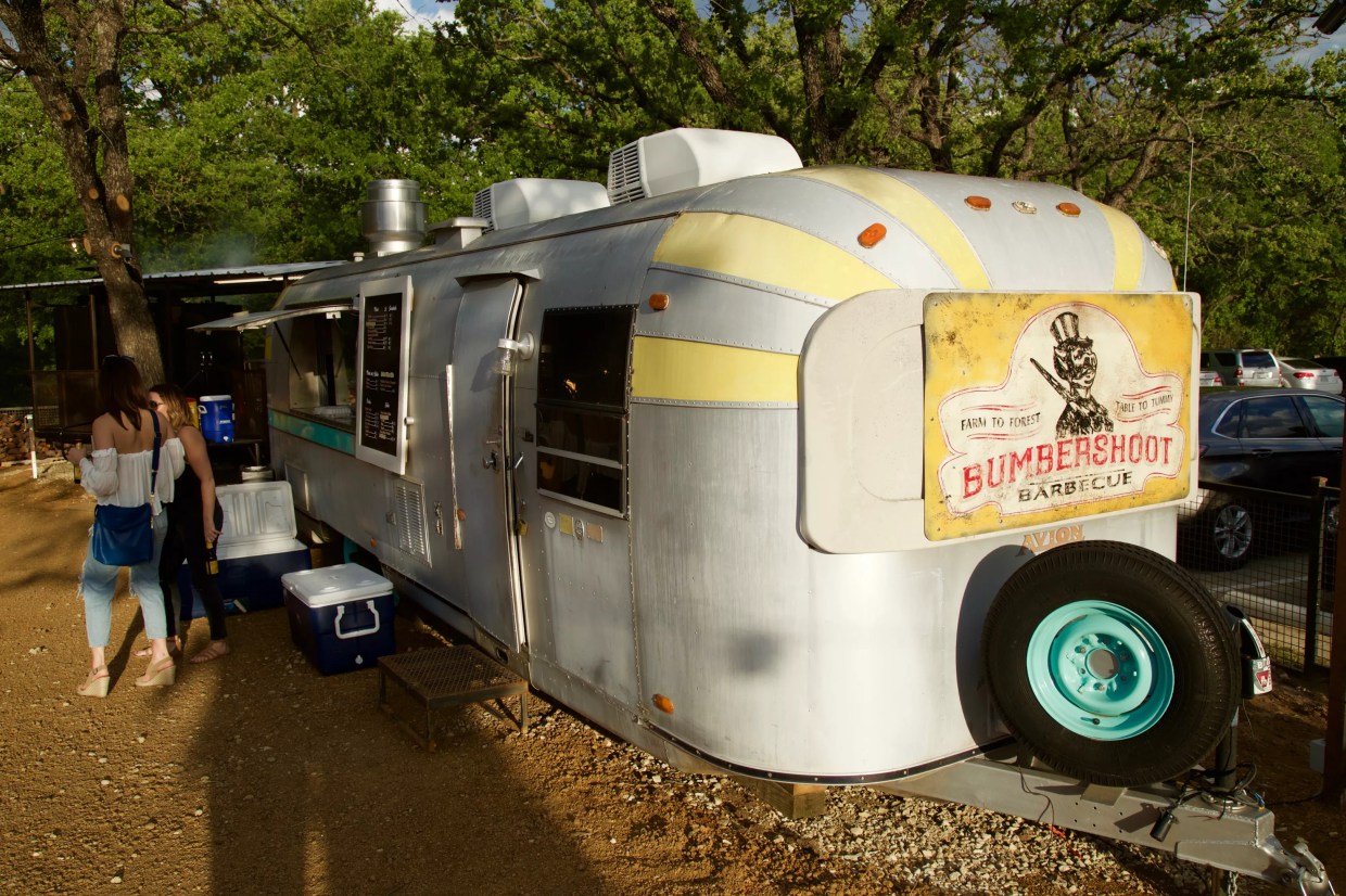 Barley & Board Team Transforms a Vintage Travel Trailer Into a ‘Barbecue Outpost in the Trees’