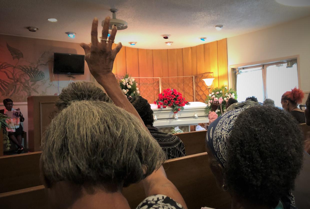 A Car Wash Congregation Chants the Bible and Sings ‘Lay my Burden Down’
