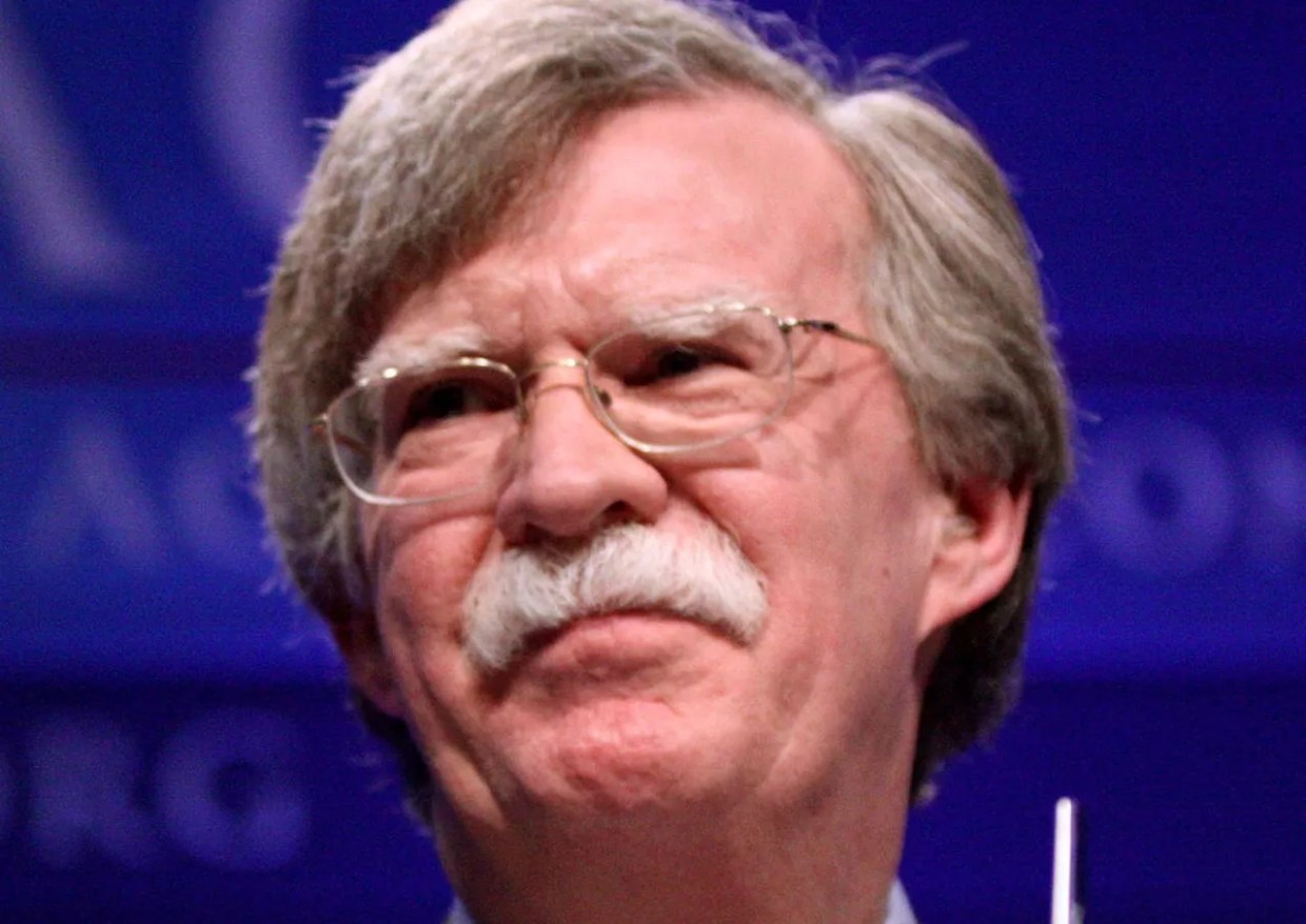 It’s All About Bolton’s Mustache. The Rest Is Misdirection.