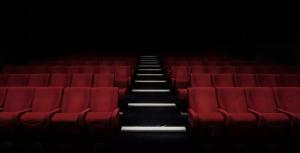 An empty movie theater with red seats. The North Texas Film Festival will not be returning.