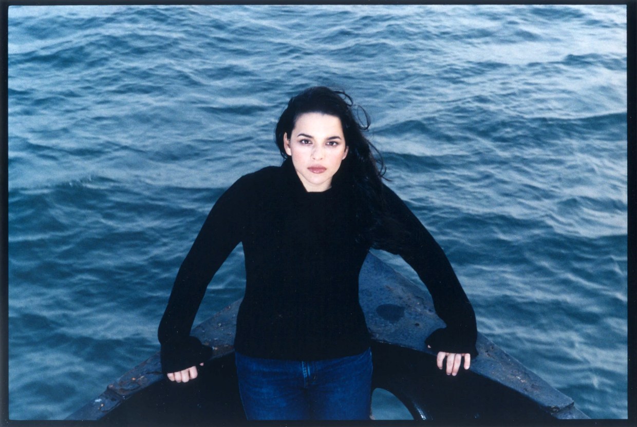 Norah Jones is pictured from around the time her album Come Away With Me was released 22 years ago.