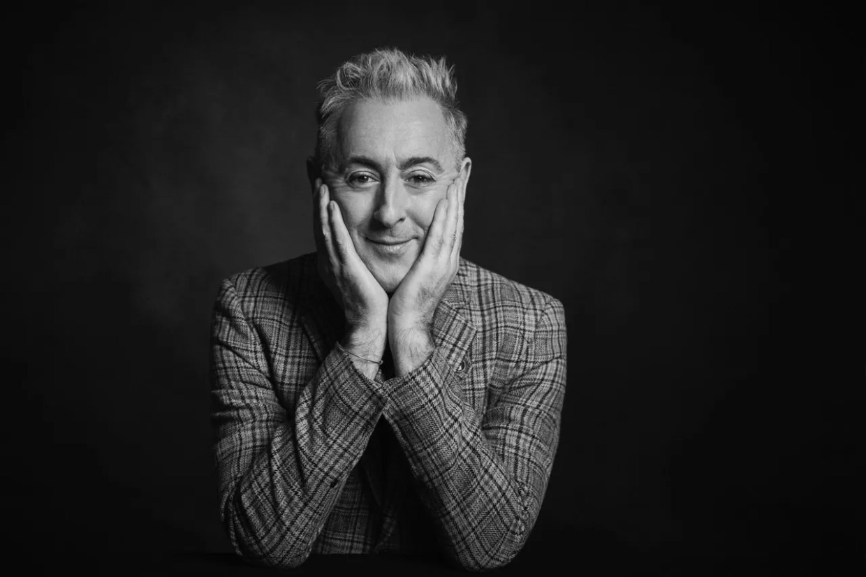 A black-and-white headshot photo of Scottish actor Alan Cumming, who is bringing his quirky showmanship to Dallas' Moody Performance Hall.