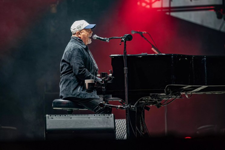 Billy Joel at the piano onstage in Dallas./