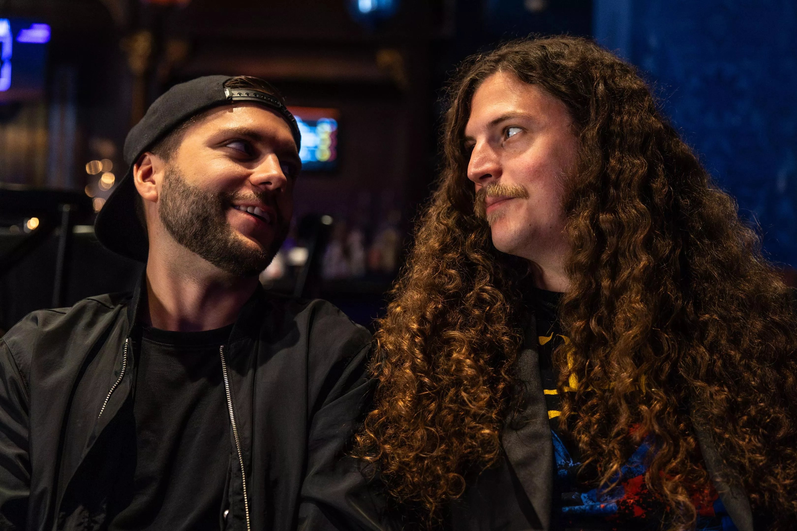 Musicians Doug McKenna (left) and Patrick Smith (right) hang out before an Omega Station show.