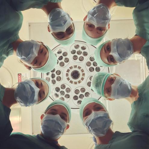 doctors and surgeons in operating room