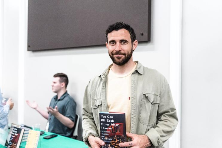 patrick strickland with book