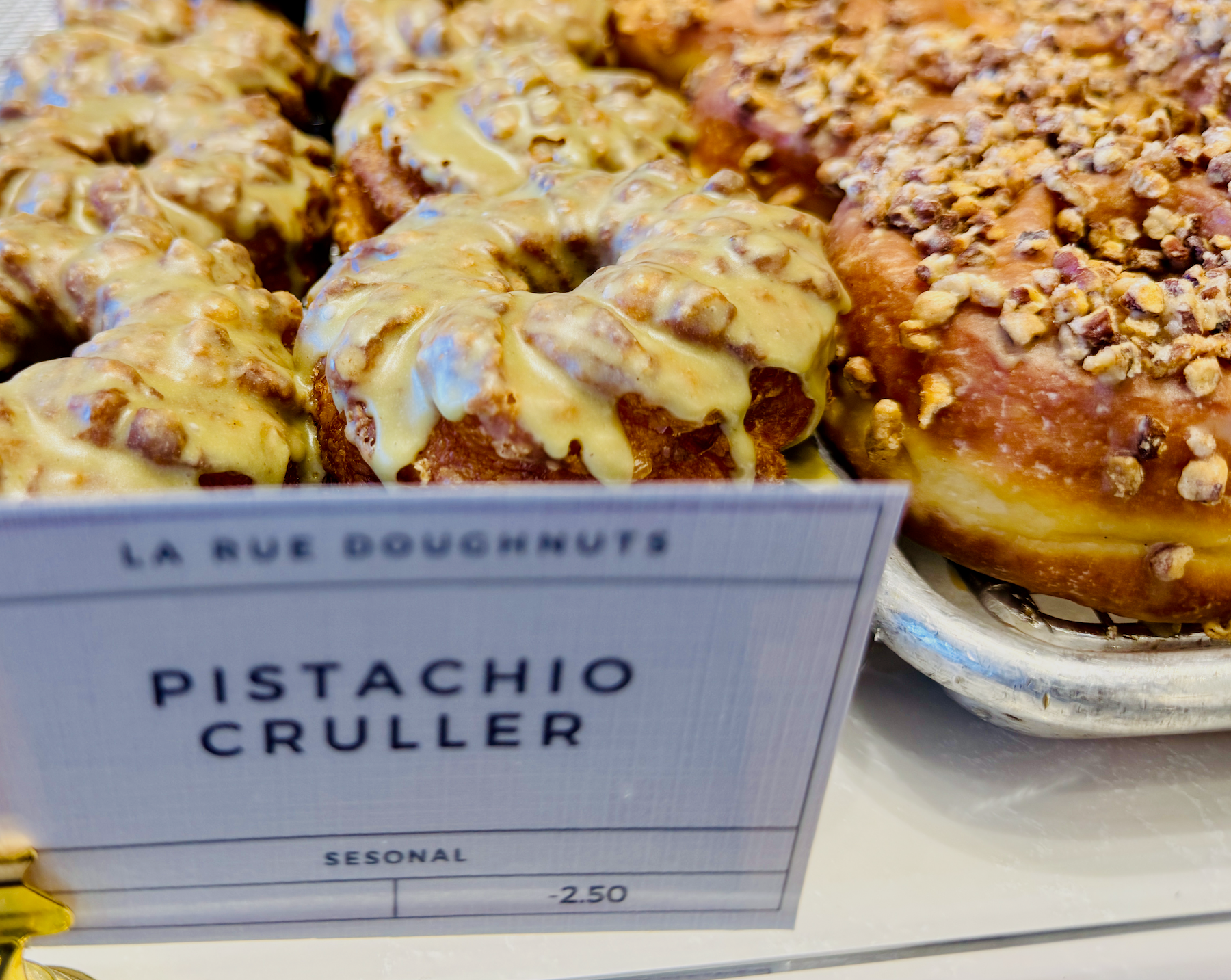 a pistachio cruller from La Rue