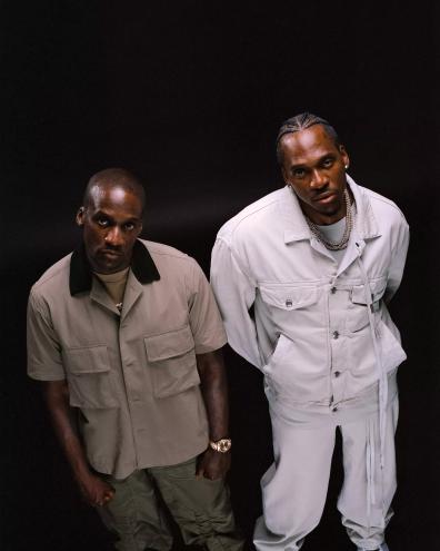 Two men standing posing for a photo