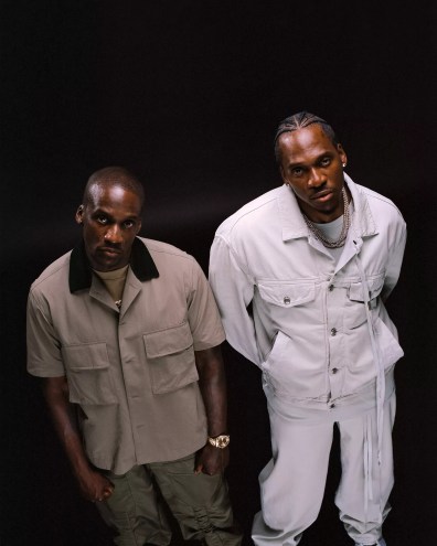 Two men standing posing for a photo
