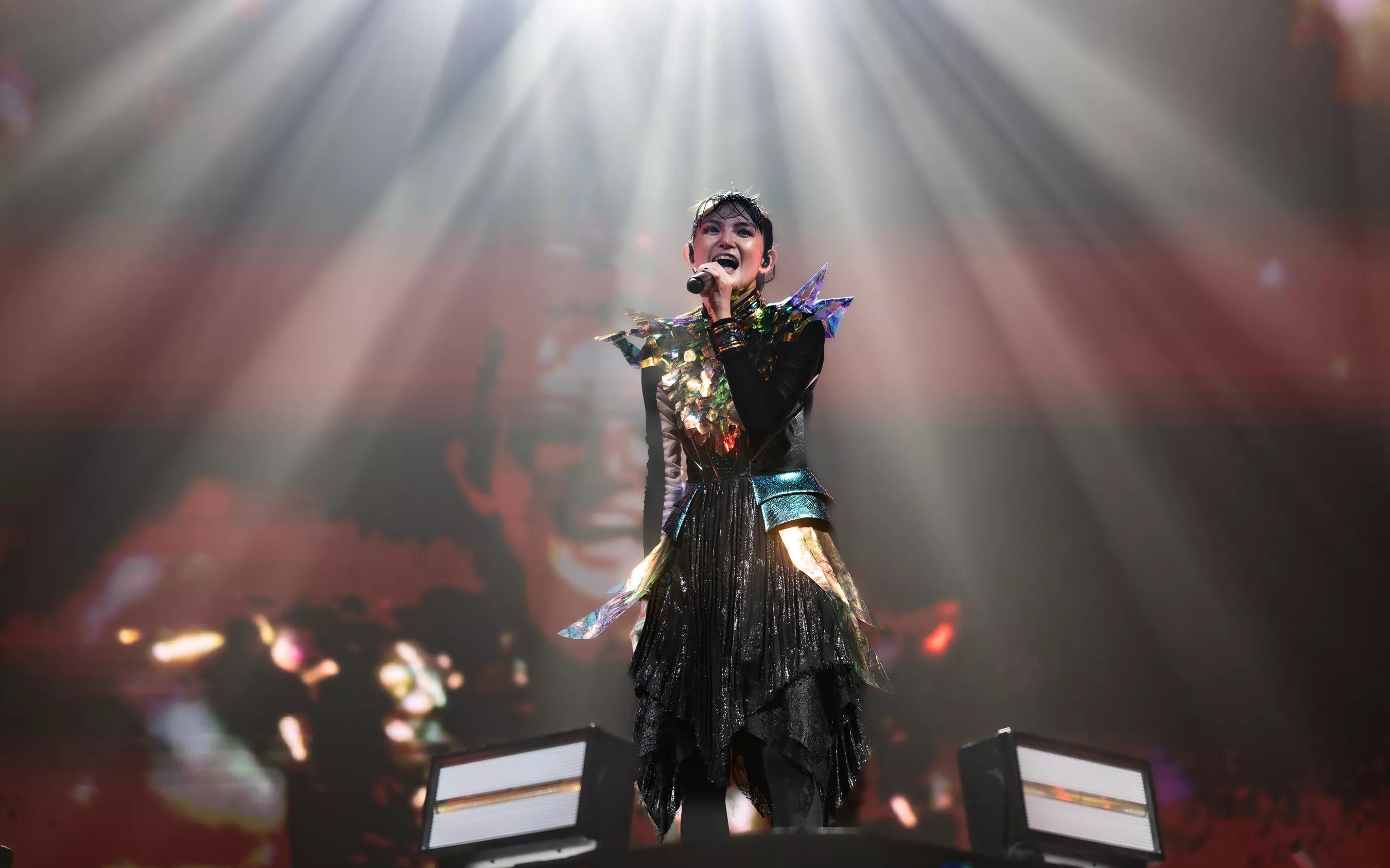 Woman performing on stage