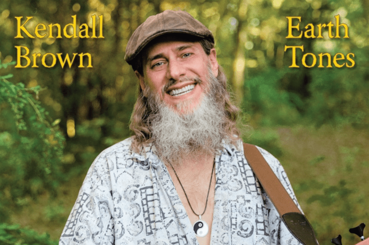 Man smiling for an album cover