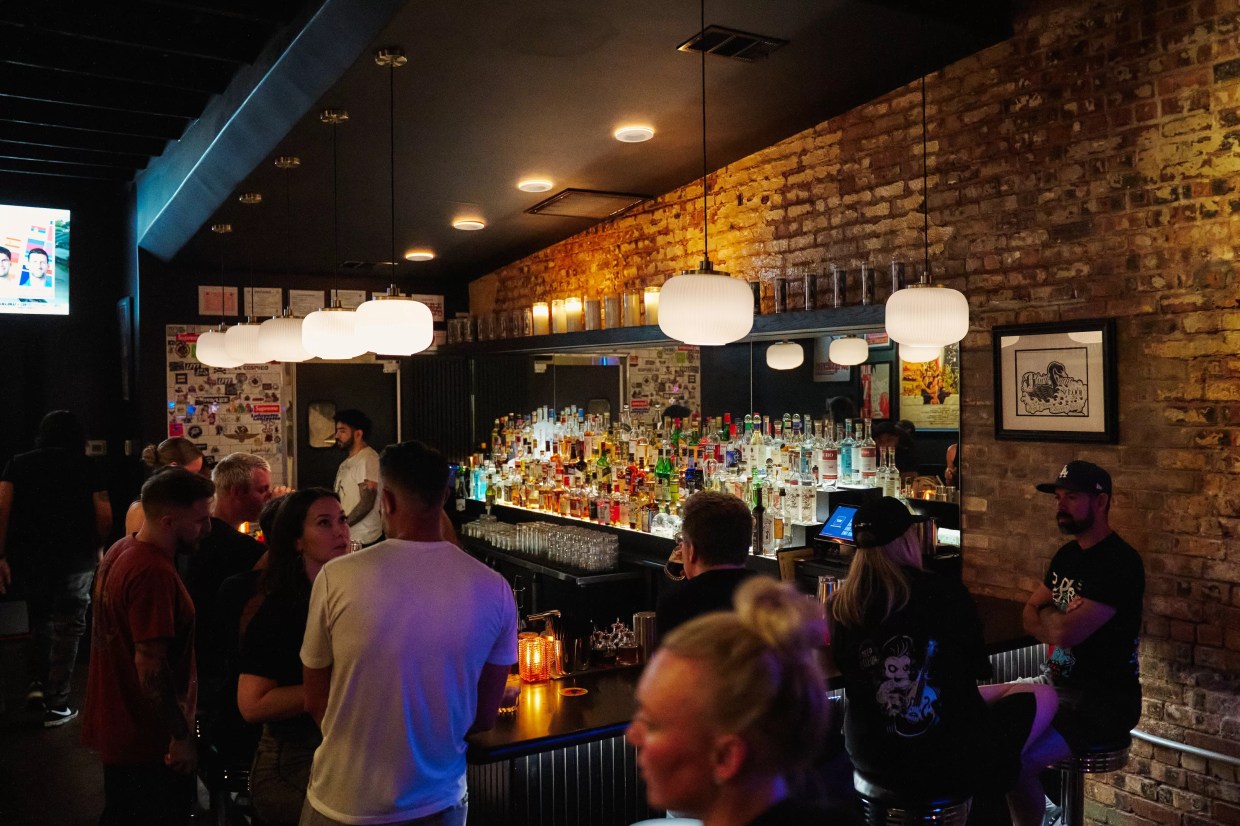a crowd at The Black Swan Saloon