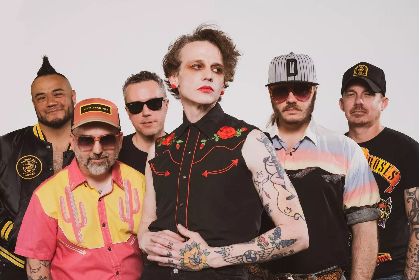 Band is posing for a picture